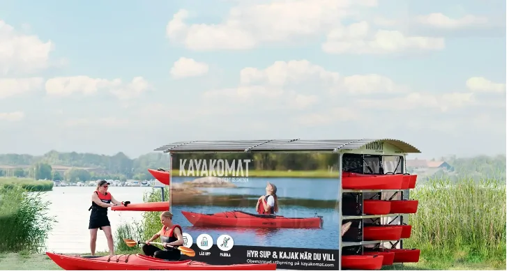 Kayakomat self-service kayak station beside a lake